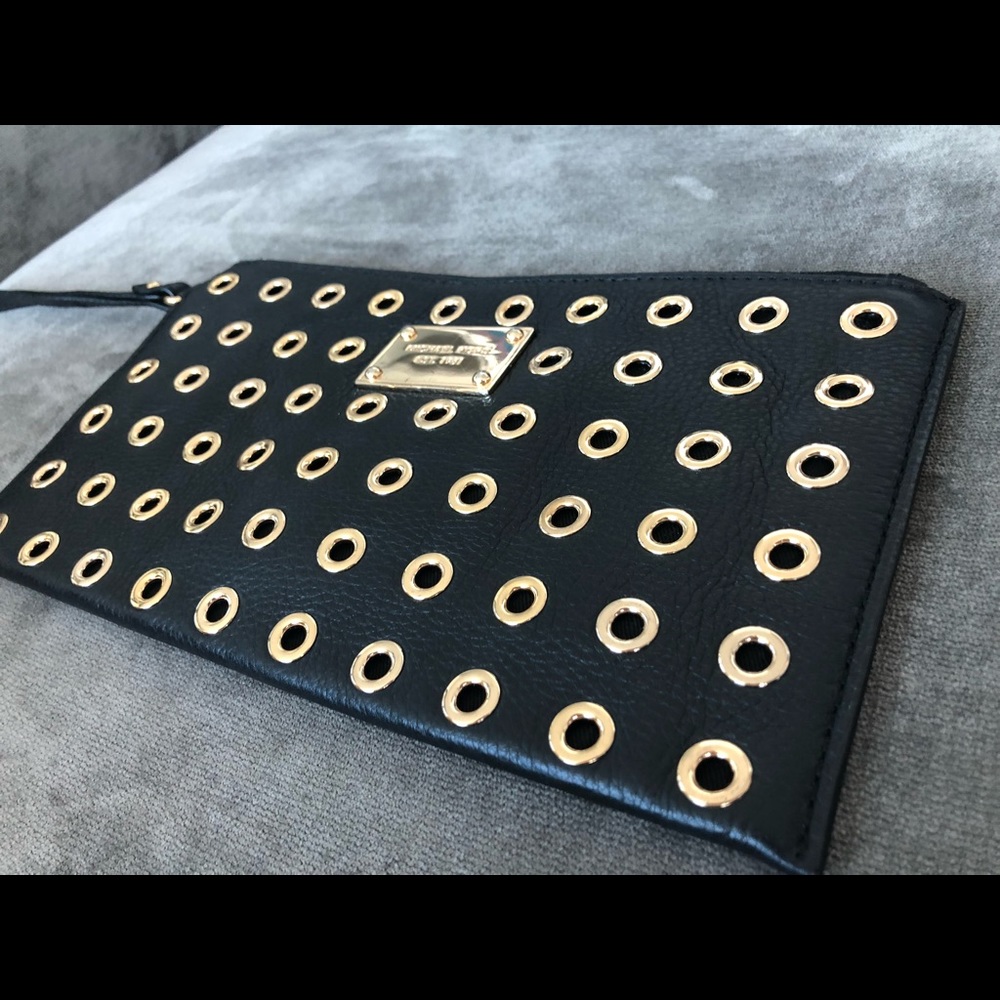 MICHAEL KORS leather grommet embellished clutch